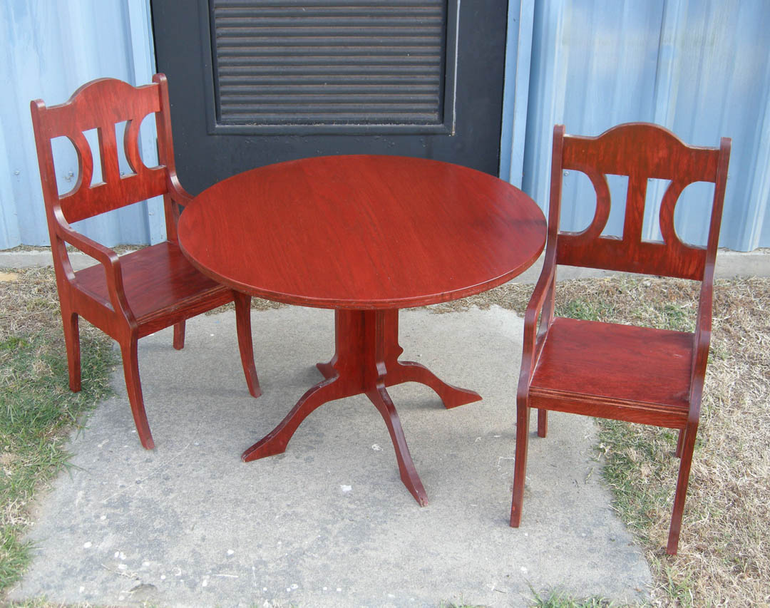 Click to enlarge,     A red pedestal table with chairs is just one of more than 100 handcrafted wood and metal items available at the Central Carolina Community College Foundation Furniture Auction June 5. Proceeds from the Auction primarily fund a scholarship endowment for Harnett County students at the college. The Auction takes place in the Multipurpose Room of the Miriello Building on the college&#8217;s Harnett County Campus, 1075 E. Cornelius Harnett Blvd., Lillington. Viewing starts at 11 a.m. and bidding, at 12 p.m. For more information on the auction, call the Harnett County Campus, (910) 893-9101. See pictures of the items being auctioned at the college&#8217;s web site,  www.cccc.edu . Click on the right arrow next to the &#8220;Learn More&#8221; boxes and then click on the Foundation Furniture Auction box. 