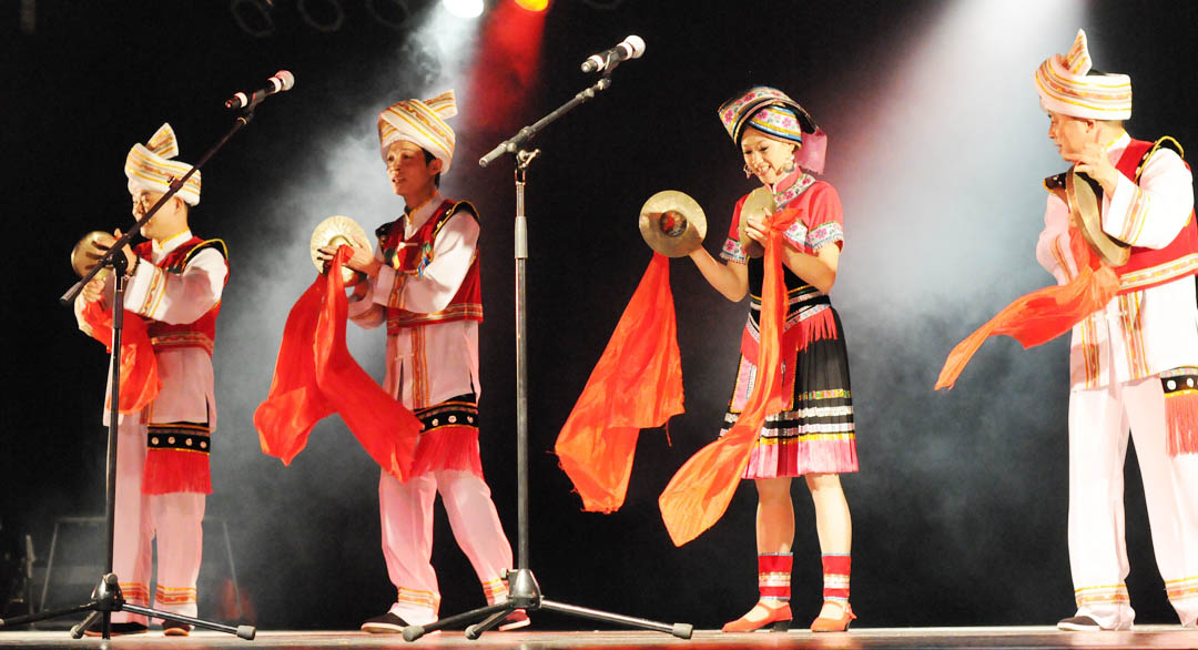 Click to enlarge,  Members of the Ethnic Arts Troupe at Jishou University&#8217;s College of Music and Dance perform &#8216;The Golden Pheasant Flying Out of the Mountain,&#8217; during the troupe&#8217;s show Sunday at the Dennis A. Wicker Civic Center. The song is traditional folk music played on cymbals by the Tujia Tribe of Hunan Province, the People&#8217;s Republic of China. It is on the U.N. World Culture Heritage List. Central Carolina Community College&#8217;s Confucius Classroom, in partnership with North Carolina State University&#8217;s Confucius Institute, hosted the free performance. For more information about CCCC&#8217;s Confucius Classroom, visit  www.cccc.edu/confucius  or call (919) 718-7386 or (919) 718-7376. 