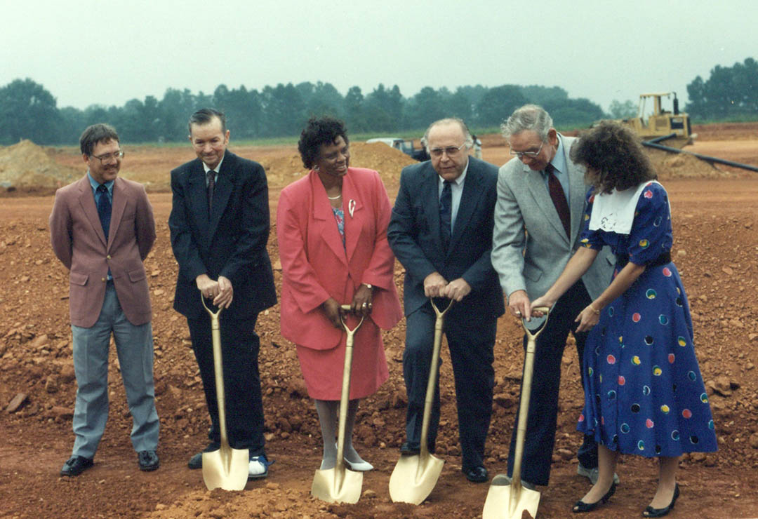 Click to enlarge,  Central Carolina Community College representatives and Chatham County officials break ground for the college's first permanent facility in the county on Aug. 26, 1991, at the site of the new Chatham County Campus, in Pittsboro. The building opened in 1992 and still houses the college's administrative offices, student center, and some classrooms. Pictured (from left) are CCCC Associate Dean of Chatham Operations Charles White; Chatham County Commissioners Earl Thompson, Margaret Pollard and Henry Dunlap; CCCC Board of Trustees Chairman R.B. Guthrie; and Chatham County Economic Development Director Melanie O'Connell. CCCC is celebrating 50 years of service to its communities during the 2011-12 school year. The Chatham Celebration takes place at the Pittsboro Campus, 764 West St., Saturday, April 28. Everyone is invited to this event filled with activities for all the family. A 5K Rabbit Run starts at 8 a.m., with all-day free events running 9 a.m.-1:30 p.m. For more information about the celebration, go to  www.cccc.edu/50years/events . 