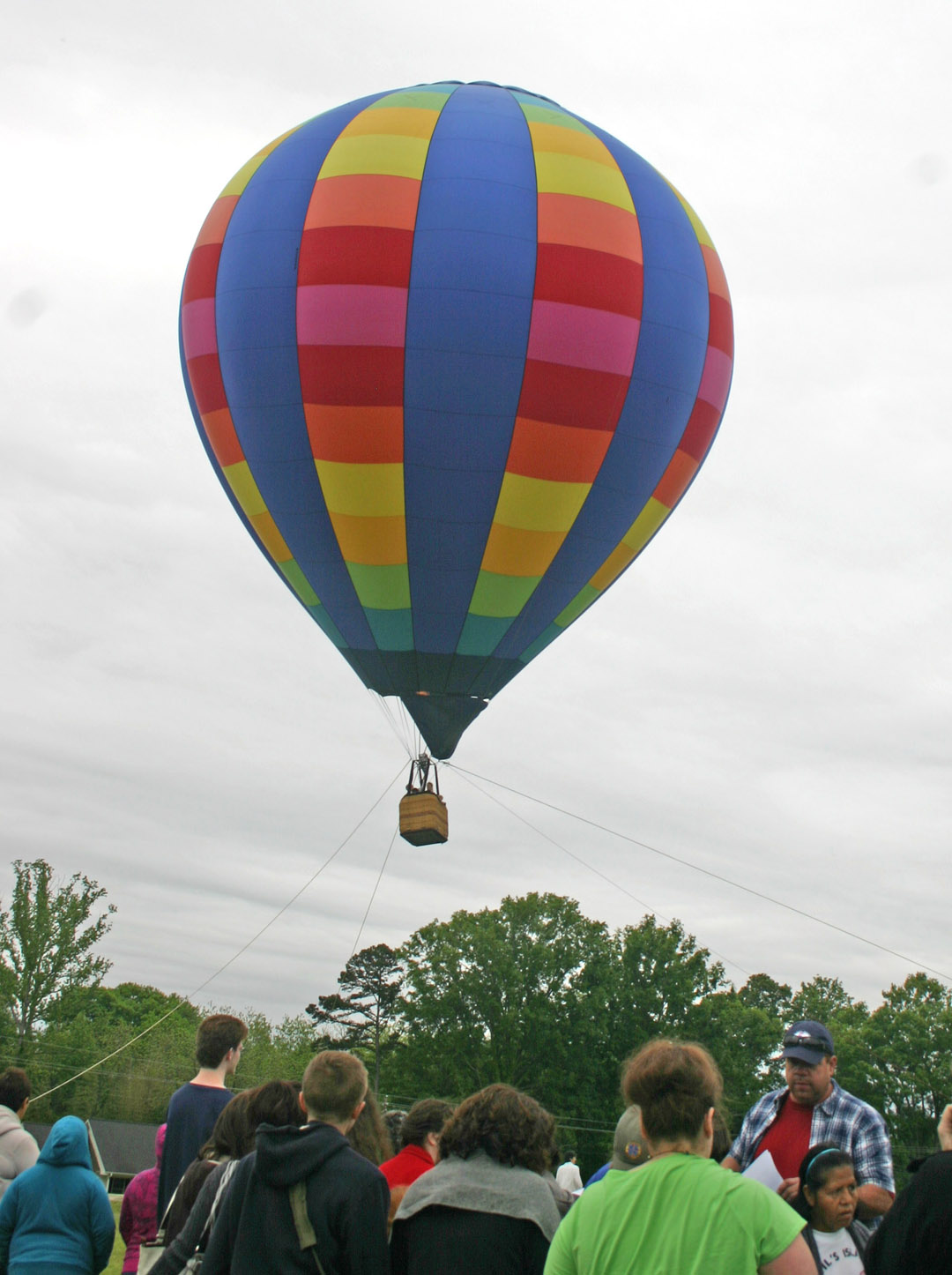 Click to enlarge,  A huge tethered balloon offered an exciting lift above the Chatham County Campus of Central Carolina Community College April 28 during the college's 50th Anniversary celebration. The balloon, which rose about 40 feet off the ground, attracted a crowd of adults and children, all eager for their turn. It was one of the attractions at the celebration, which drew hundreds of visitors. The college's 50th celebration will continue, with an event June 2 at the Harnett County Campus and a final event June 28 at the Dennis A. Wicker Civic Center. Information about both events will be posted at  www.cccc.edu/50years  as details are finalized. 