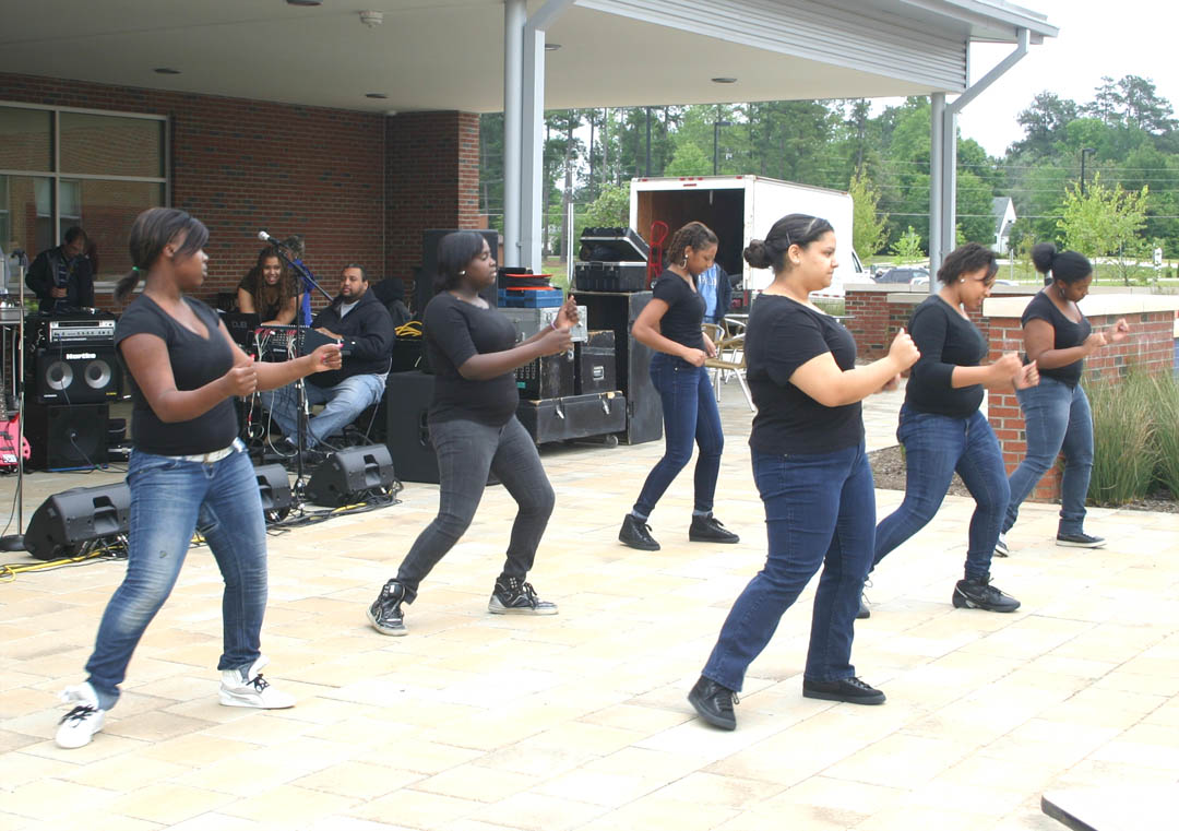 Click to enlarge,  The Step Team from Northwood High School was among the groups entertaining at Central Carolina Community College's 50th Anniversary celebration April 28 at the college's Chatham County Campus. The event attracted hundreds of visitors. The college's 50th celebration will continue, with an event June 2 at the Harnett Campus and a final event June 28 at the Dennis A. Wicker Civic Center. Information about both events will be posted at  www.cccc.edu/50years  as details are finalized. 