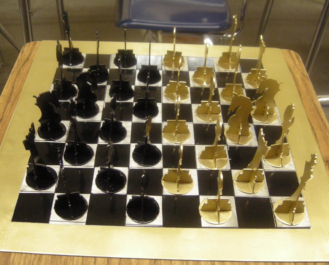 Click to enlarge,  A handsome metal chess set will be among the items up for bid at the Central Carolina Community College Foundation's 13th Annual Furniture Auction Saturday, June 1, in the Multipurpose Room of the Miriello Building on the college's Harnett County Campus, 1075 E. Cornelius Harnett Blvd. Viewing and registration starts at 9 a.m. and bidding, at 10 a.m. For more information about the CCCC Foundation Furniture Auction, call (910) 893-9101 or go online to www.cccc.edu/foundation/events/furnitureauction to see a photo gallery of the auction pieces. 