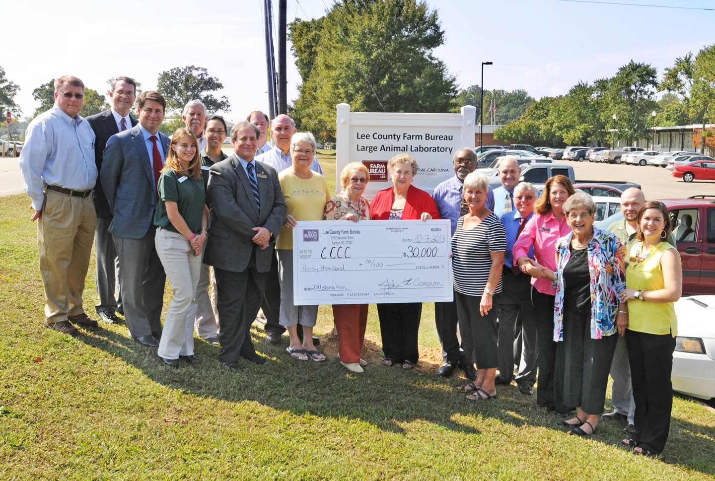 Click to enlarge,  Members of the Lee County Farm Bureau, CCCC administrators, and Veterinary Medical Technology instructors and students gathered at the college's Lee County Campus Oct. 3 for the presentation of a $30,000 check by the Bureau to the CCCC Foundation for the VMT Department. The department will use the funds to buy an endoscope and imaging equipment. For more information about the VMT program at CCCC, visit www.cccc.edu and click on "Veterinary Medical Technology" in the "A-Z Index," or contact Dr. Kim Browning at 919-718-7393 or e-mail her atkbrowning@cccc.edu.  