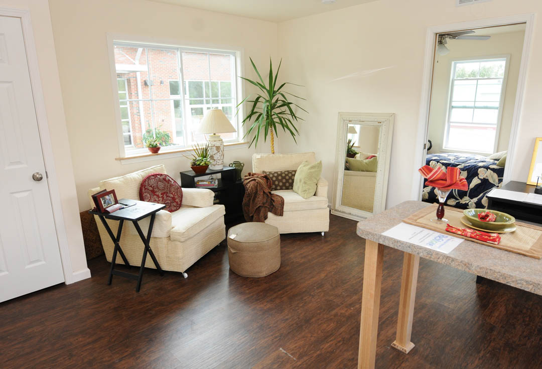 Click to enlarge,  During the 2012-13 school year, Central Carolina Community College's Sustainability Technologies students built and auctioned off an energy-efficient 450-square-foot house designed for attractiveness and livability, as seen in this interior shot. Now, the college and community partners Small House Institute, Habitat for Humanity and the Abundance Foundation have launched an Affordable Small House Competition to increase the availability of small house designs. Amateur and novice designers are invited to submit their own creative plans for energy-efficient, attractive houses with less than 500 square feet. The contest is open to individuals, schools, and non-profit organizations, not experienced professionals. Prizes will be awarded for the winning designs. For more information, contact Laura Lauffer, CCCC Sustainability coordinator, 919-545-8032 or llauffer@cccc.edu.  