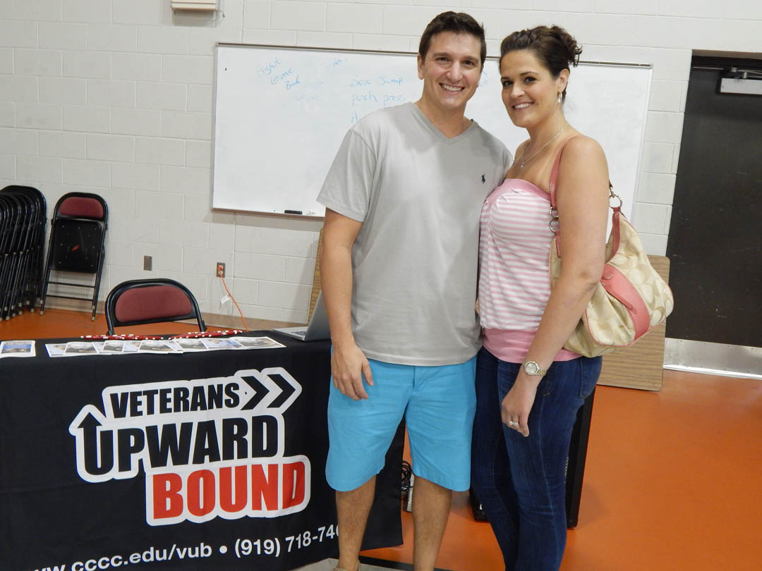 Click to enlarge,  Former Army Sgt. Isaac Phillips (left) of Chapel Hill, with his wife, Andrea Phillips, was among the veterans attending Central Carolina Community College's July 10 Veterans Upward Bound Appreciation Day at the Lee County Campus. Phillips served in Operation Enduring Freedom and other operations. With the assistance of VUB, he has enrolled and is now working on an Associate in Science degree. The Appreciation Day was a family-friendly event for veterans either enrolled in or interested in learning about the services provided by VUB. For more information about Central Carolina Community College's Veterans Upward Bound program, call 919-718-7463 or email veteransub@cccc.edu. Information is also available at www.cccc.edu/vub/. 