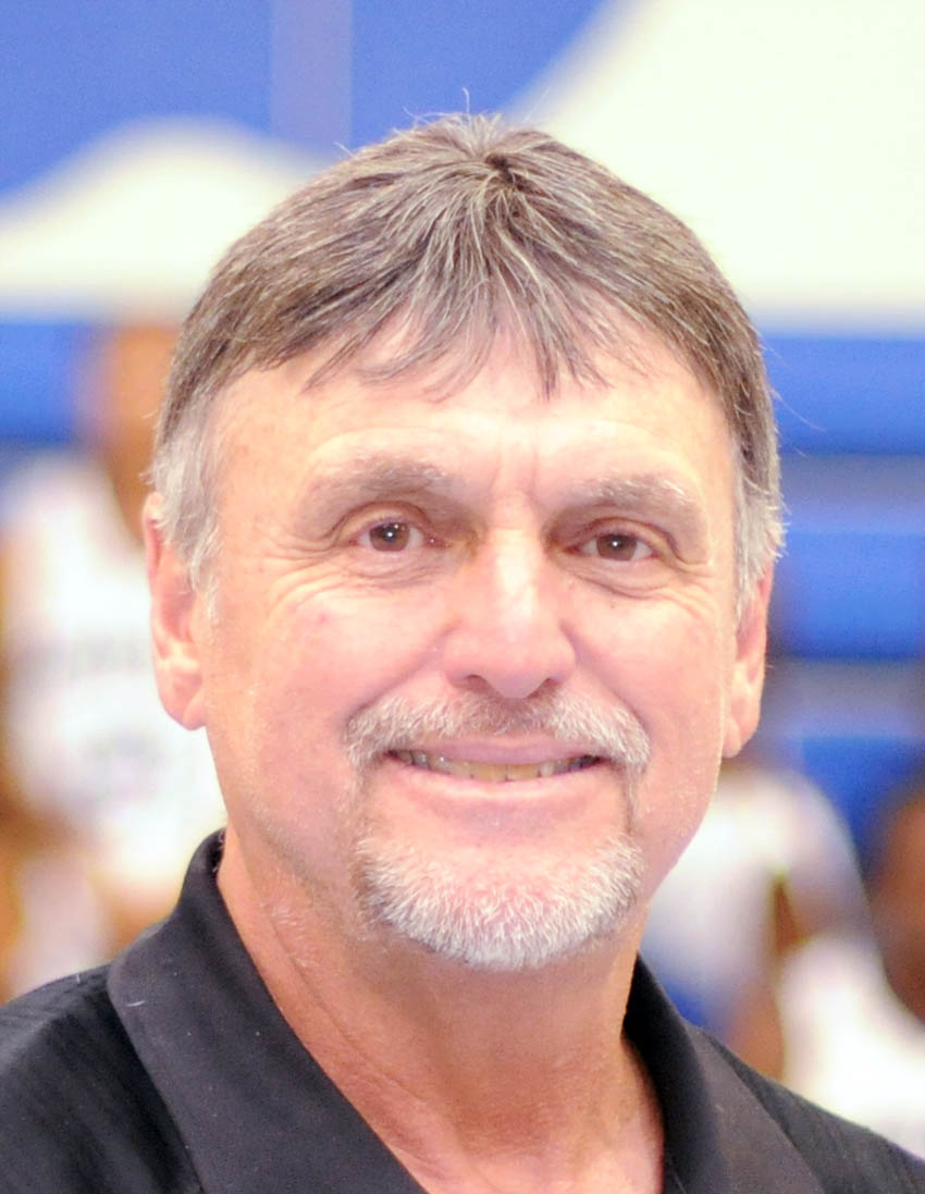 Click to enlarge,  Men's basketball coach Doug Connor 