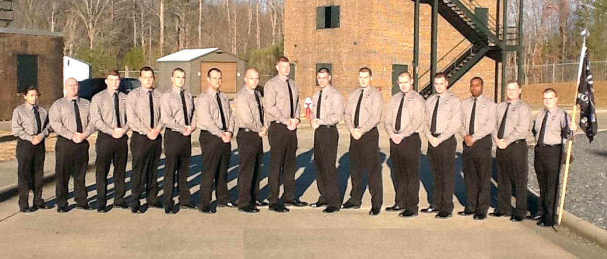 Click to enlarge,  Recent graduates of the Central Carolina Community College Basic Law Enforcement Training program are, left to right: Yuridia Bahena-Ocampo, Jonathan Mark Moore, Andrew Joseph Holder, Carson Hunter Perry, Brandon Douglas Havens, Mitchell Ethan Lanphier, Dexter Ray Jarmon, Matthew Franklin Cotten, Justin Ryan Thomas, Kelly Forrest Rhyne, William Daniel Holder, Samuel Alexander Macinsky, Omari Tahir Geiger, Shawn Christopher Cronin, and Jonathon Michael Ross. For more information on the Central Carolina Community College Basic Law Enforcement Training program, contact Robert Powell at rpowell@cccc.edu or call 919-777-7774, or visit the college website at www.cccc.edu/blet. 