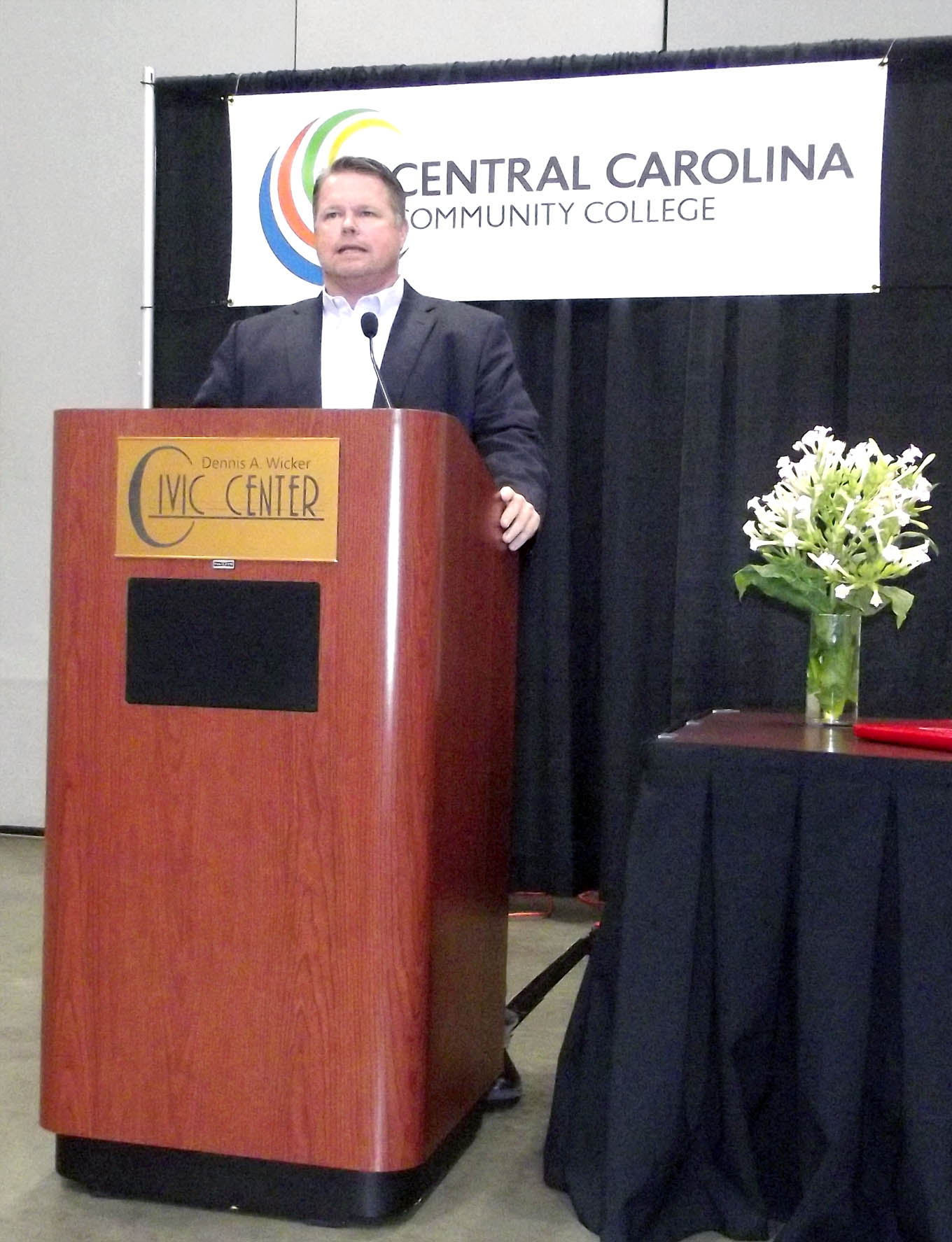 Click to enlarge,  Jamie Kelly, who recently was saluted for his service to the Central Carolina Community College Board of Trustees, noted that the college is a shining star in the State of North Carolina. 