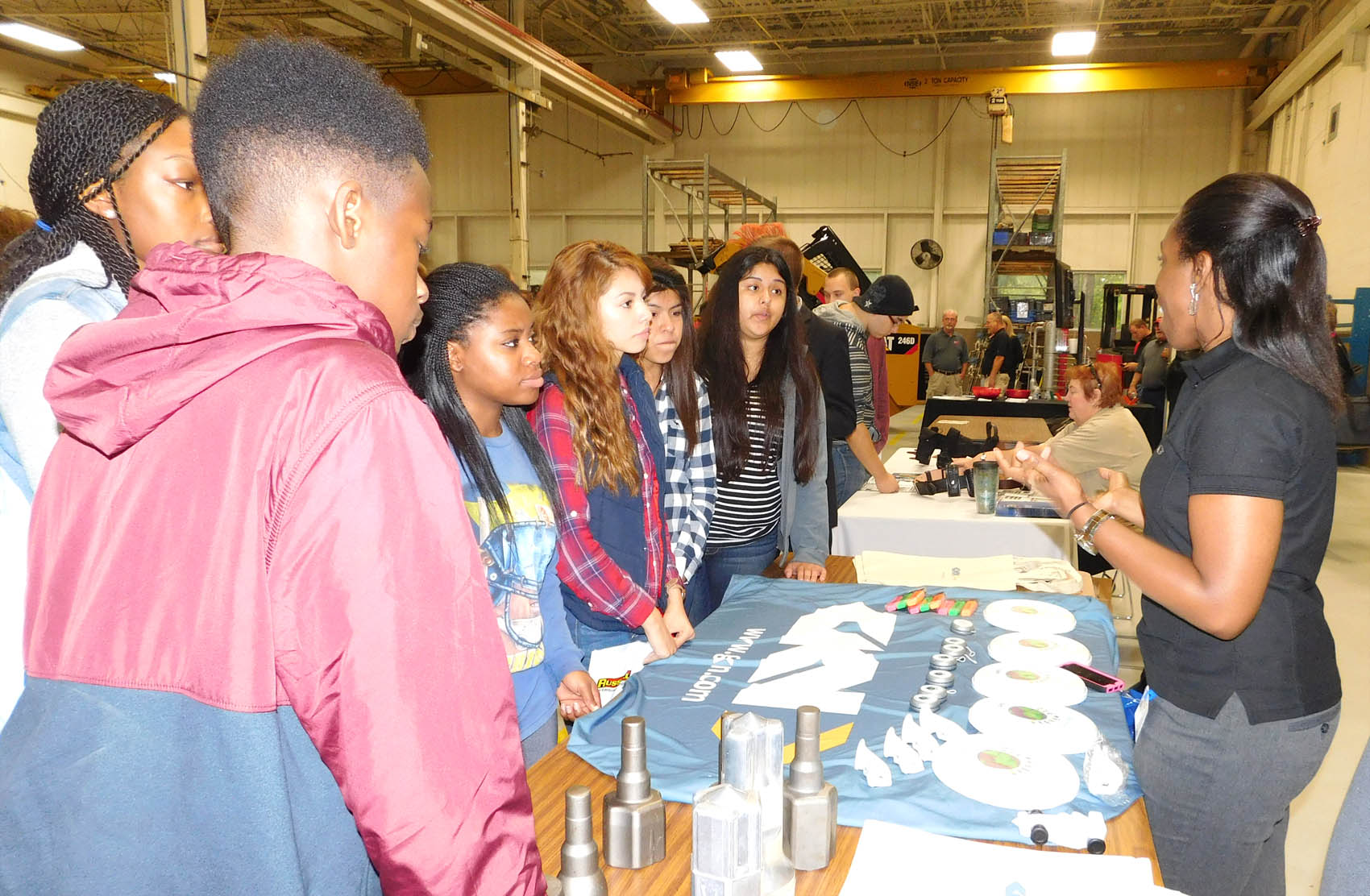 Click to enlarge,  Area students learn more about GKN during National Manufacturing Day at Central Carolina Community College's Innovation Center. 