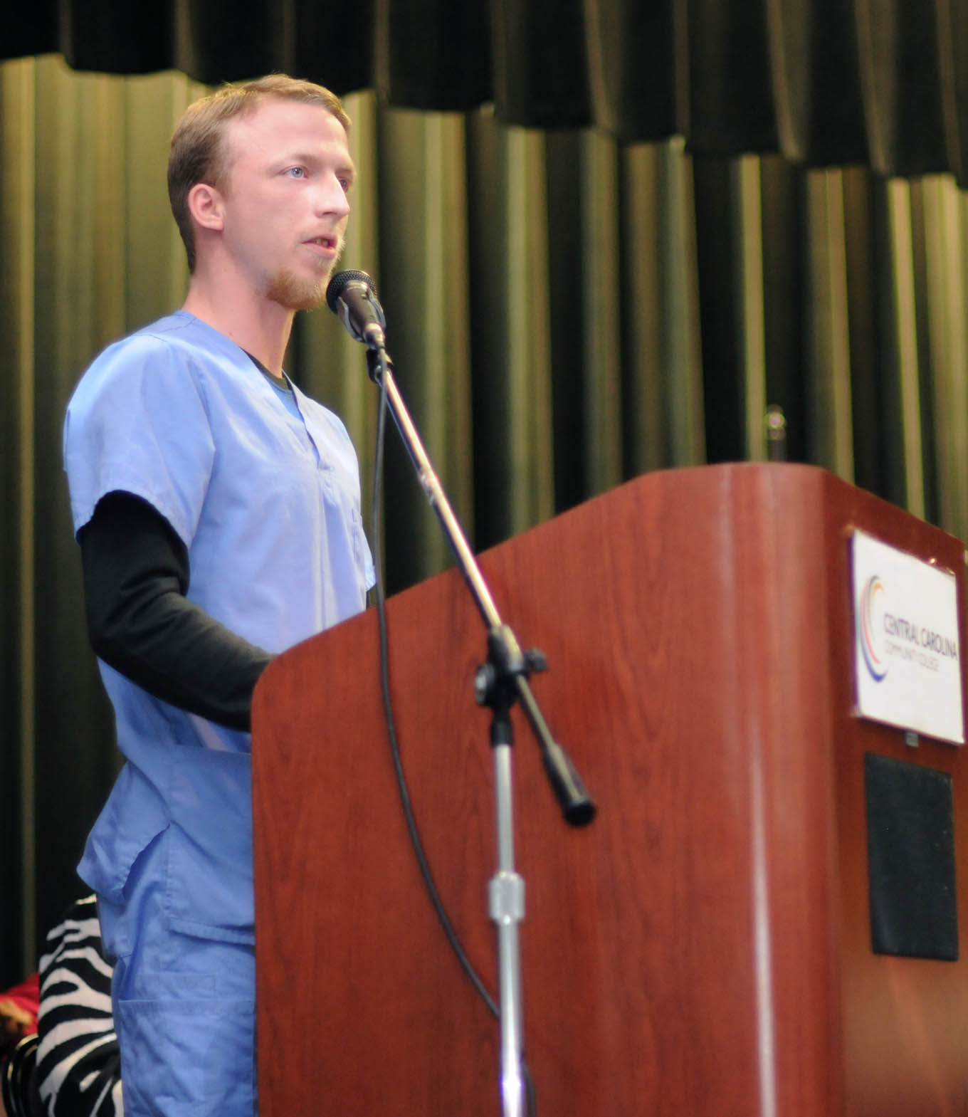 Click to enlarge,  Cody Welty, of Lee County, was one of three student speakers at the Central Carolina Community College Continuing Education medical program graduation. The event was held Dec. 10 at the Dennis A. Wicker Civic Center in Sanford. For more information about Continuing Education medial programs, call the CCCC Economic and Community Development Division Student Support Center at (919) 718-7500. 