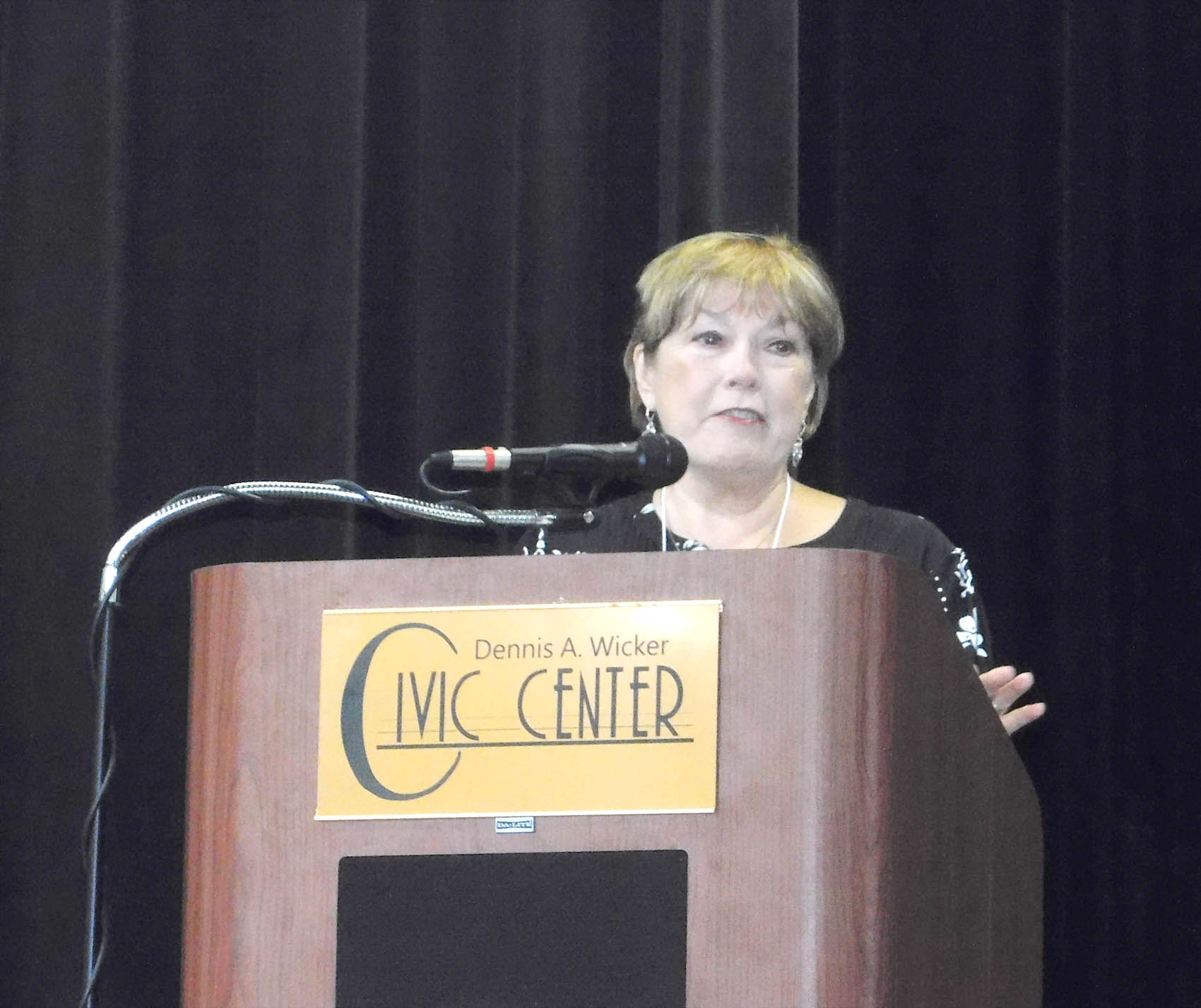 Click to enlarge,  Flo Stein, Deputy Director, Division of Mental Health, Developmental Disabilities, and Substance Abuse Services, North Carolina Department of Health and Human Services, welcomed the attendees at the NC STRIVE Conference on Wednesday, June 15, at the Dennis A. Wicker Civic Center in Sanford. 