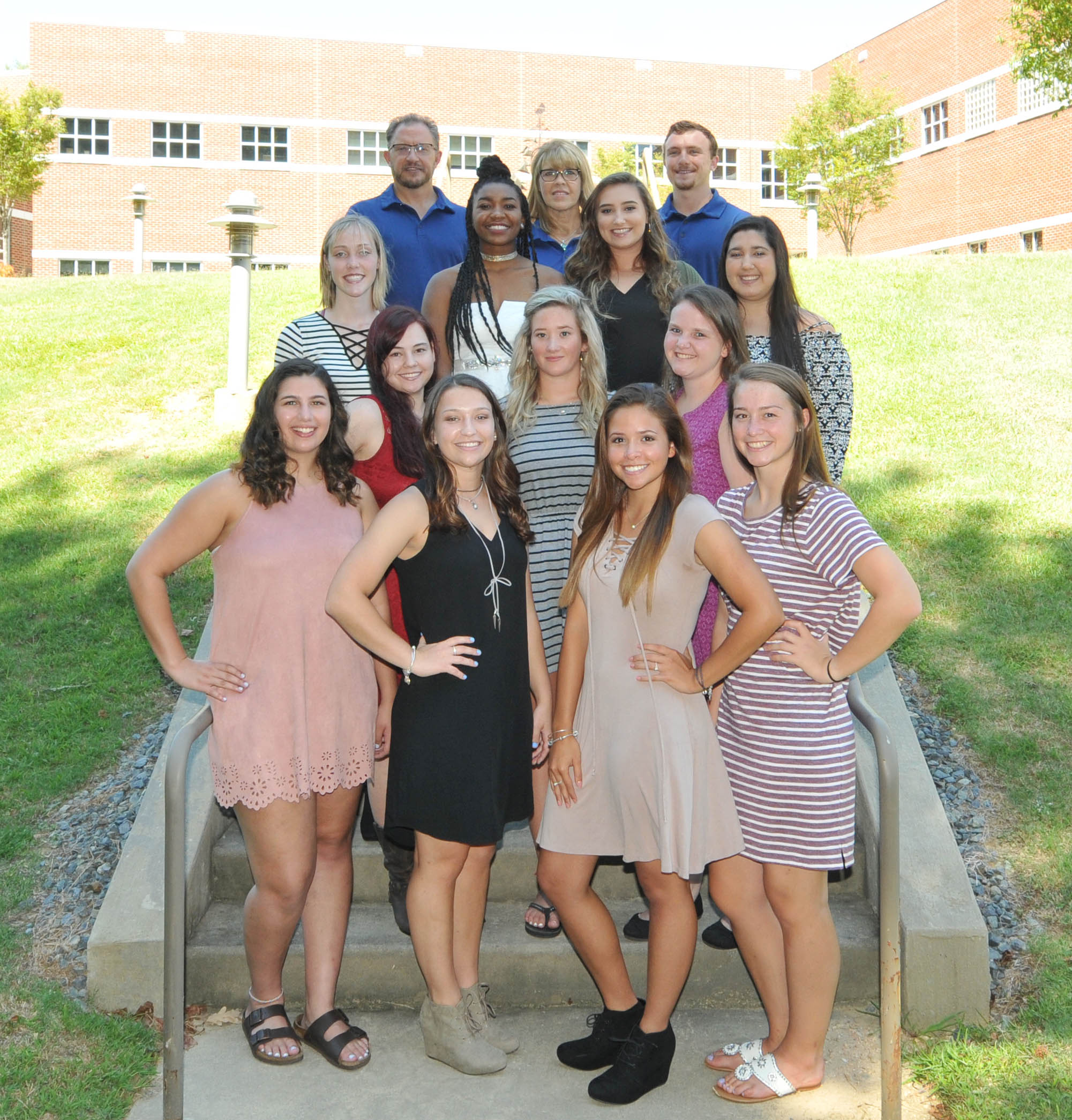Click to enlarge,  The 2017 Central Carolina Community College volleyball team is pictured, left to right: front row, Alexis Harrigan, Tara Way, Alexis Mackenzie, and Elissa Neal; second row, Samantha Denison, Brooke Young, and Emma Cowfer; third row, Katelyn Carroll, Khazhay Bowman, Spencer Thompson, and Skylar Whitton; back row, Coaches Bill Carter, Tami Carter, and William Carter. 