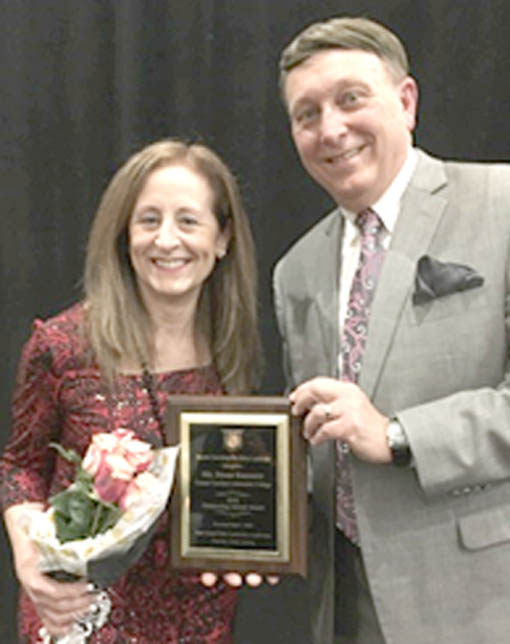Click to enlarge,  Central Carolina Community College's Diane Kannarr (left) was selected as the 2018 NC Phi Beta Lambda Advisor of the Year. 