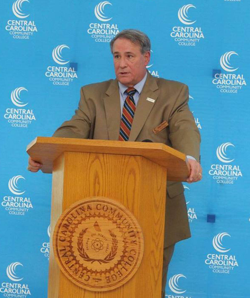 Click to enlarge,  Julian Philpott, Chairman of the Central Carolina Community College Board of Trustees, spoke to attendees at the ribbon-cutting event to celebrate the opening of the Robert and Nannie Lou Dalrymple Veterinary Medical Technology Building on Monday, Aug. 13. 
