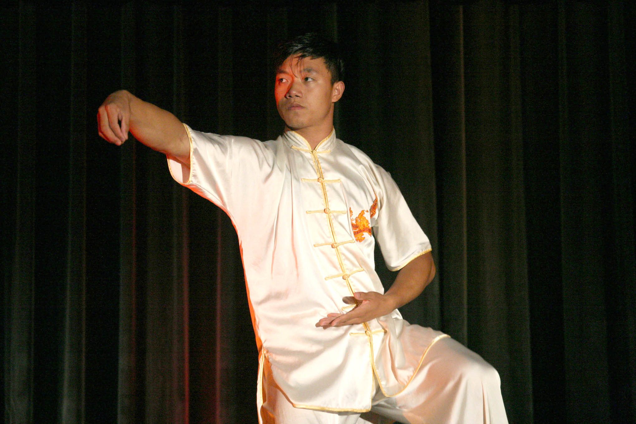 Click to enlarge,  Zhao Zan from South-Central University for Nationalities in Wuhan, China, performs martial arts set to music during a cultural exhibition at the Dennis A. Wicker Civic &amp; Conference Center in Sanford. 