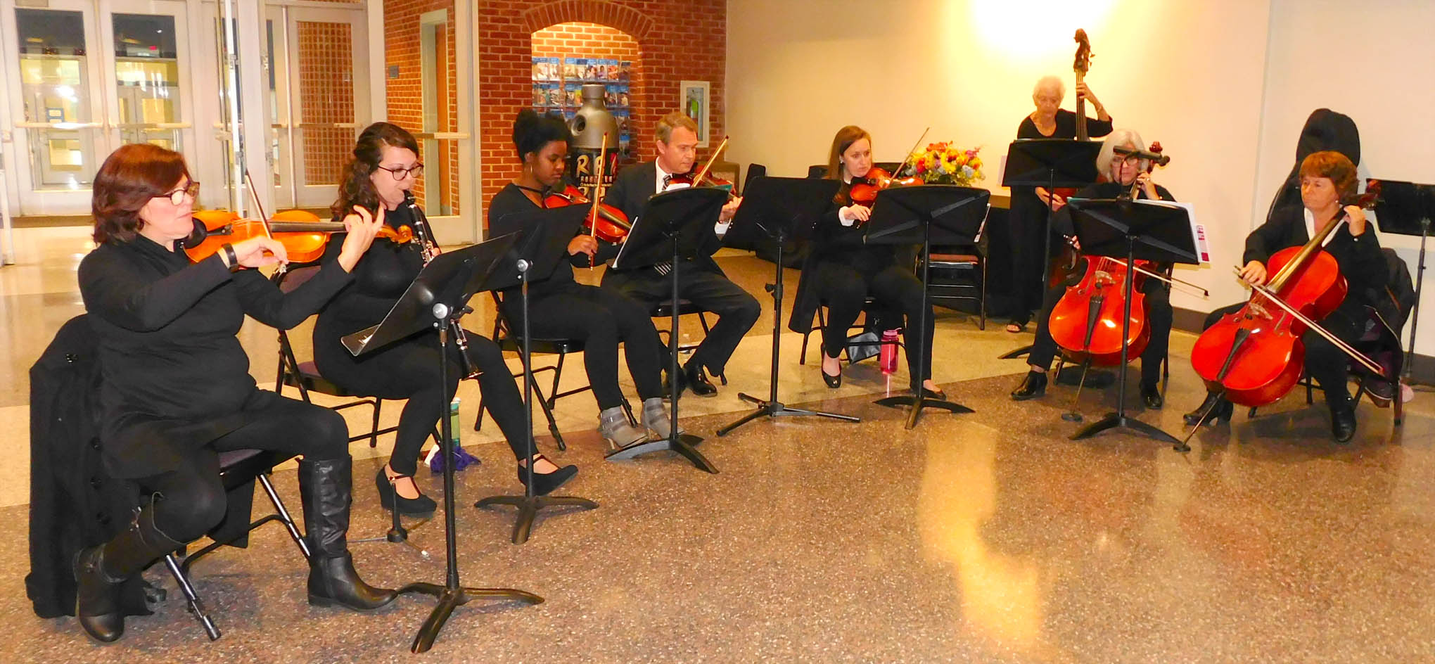 Click to enlarge,  Members of the Lee County Community Orchestra provided patriotic music during a program to honor Veterans on Monday, Nov. 12, at the Dennis A. Wicker Civic &amp; Conference Center. 