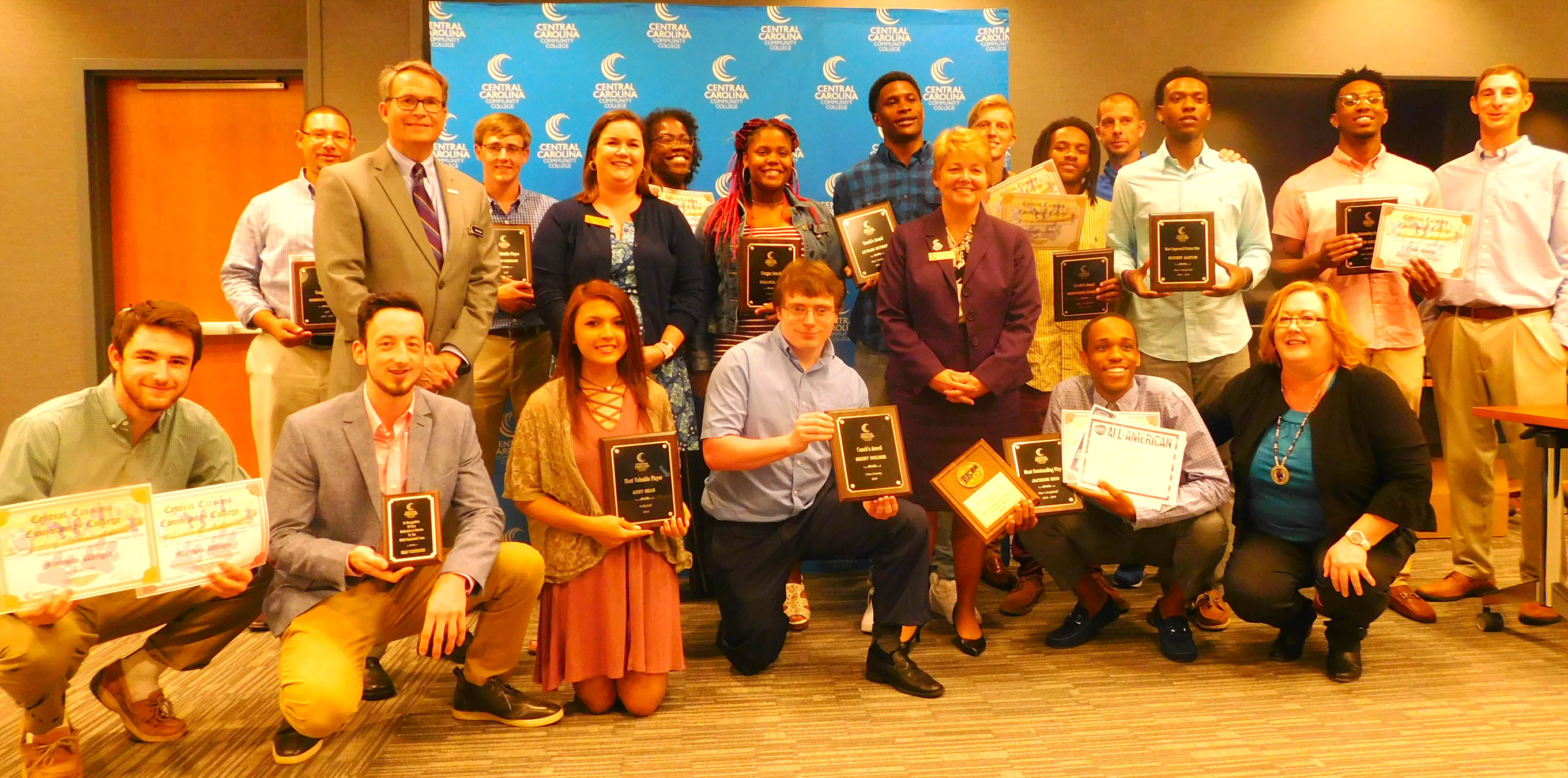 Click to enlarge,  Central Carolina Community College President Dr. Lisa M. Chapman (center) joins CCCC athletes and college officials as the athletes were feted at a banquet on Thursday, April 25. 