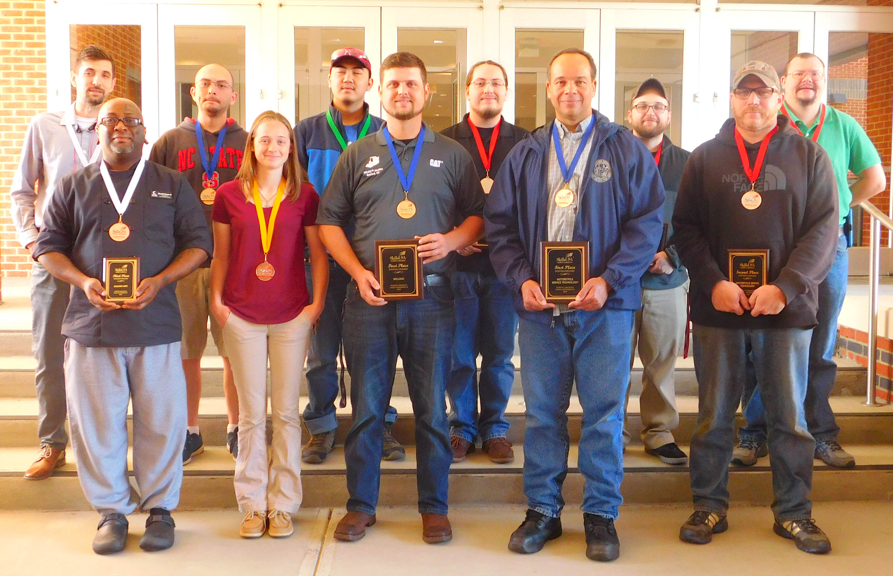 Click to enlarge,  These Central Carolina Community College students took state honors in April organized by SkillsUSA, an organization developing career and technical skills for students. They are, left to right: first row, Dazell Green, Elisabeth Finch, James Culbreth, Trevor Brown, and Kevin Alderson; second row, Justin Schrader, Zane Walker, Bryan Tran, Reece Isley, Jordan Norris, and Nathan Lamont. 