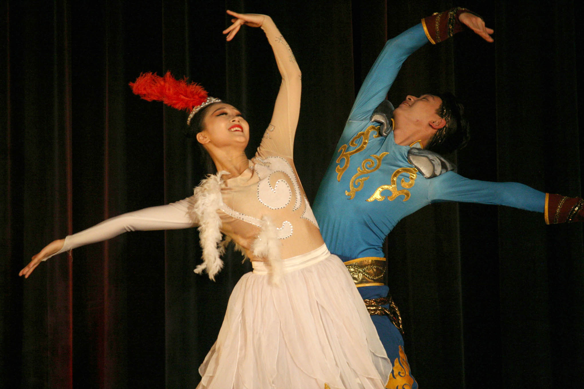 Click to enlarge,  Dancers perform "Stone Man and Swan" during a free Chinese cultural program at the Dennis A. Wicker Civic &amp; Conference Center in mid-October 2018. The dance is based on a legend from China's Kazakh ethnic group and expresses a longing for free and enthusiastic life. 