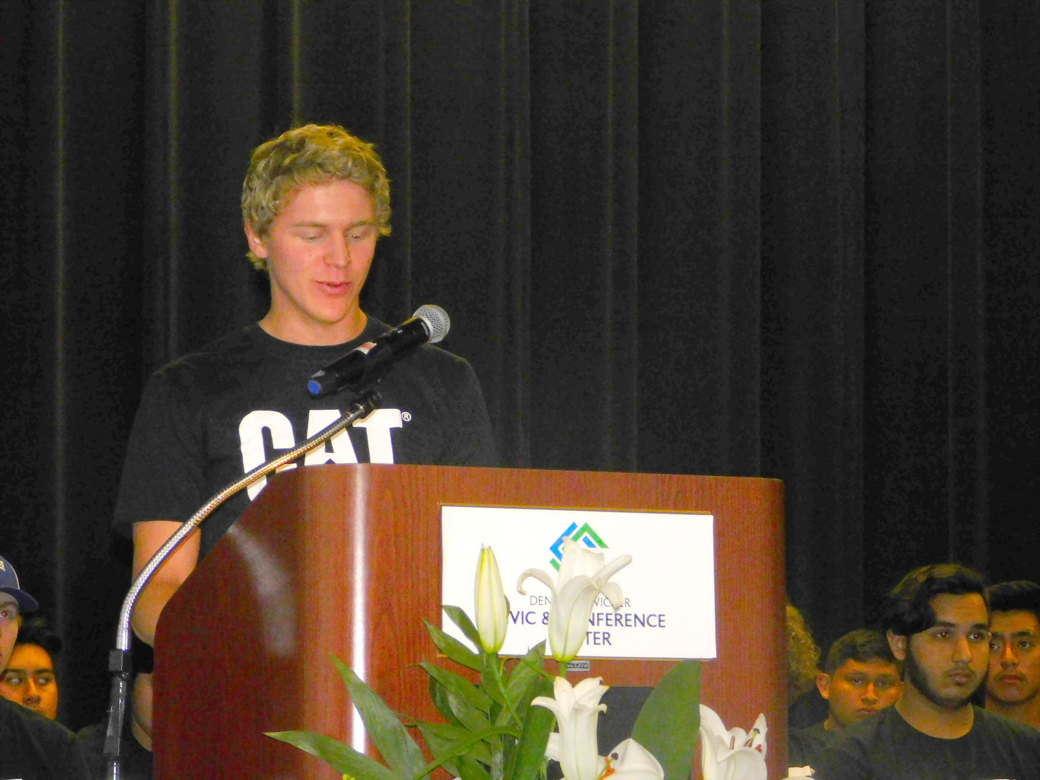 Click to enlarge,  Travis Bottom was student speaker at the Caterpillar Youth Apprenticeship Program graduation and induction. 