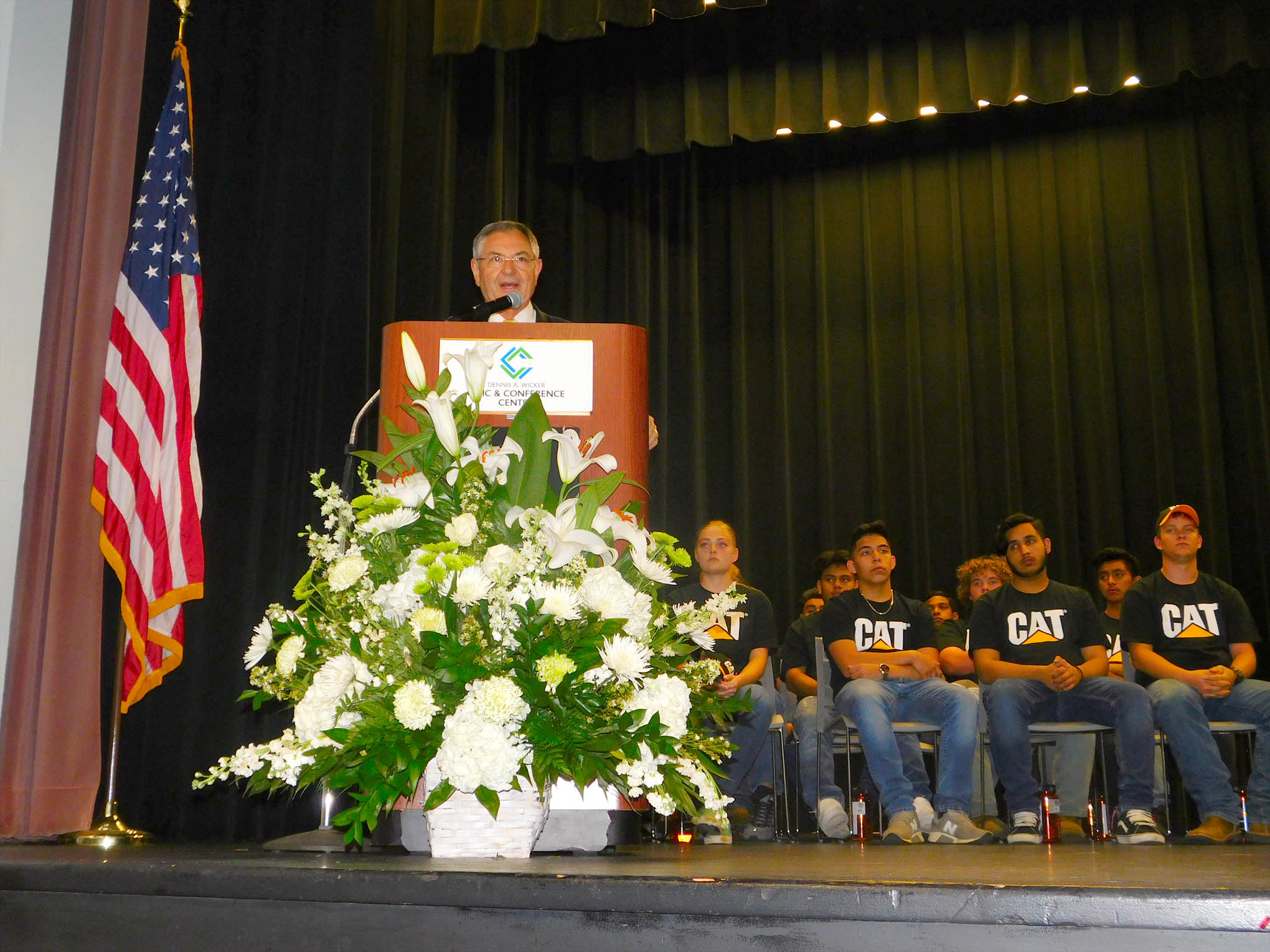 Click to enlarge,  Senator Jim Burgin, N.C. Senator District 12 and Vice Chairman of the Central Carolina Community College Board of Trustees, presented the keynote remarks at the Caterpillar Youth Apprenticeship Program graduation and induction. 