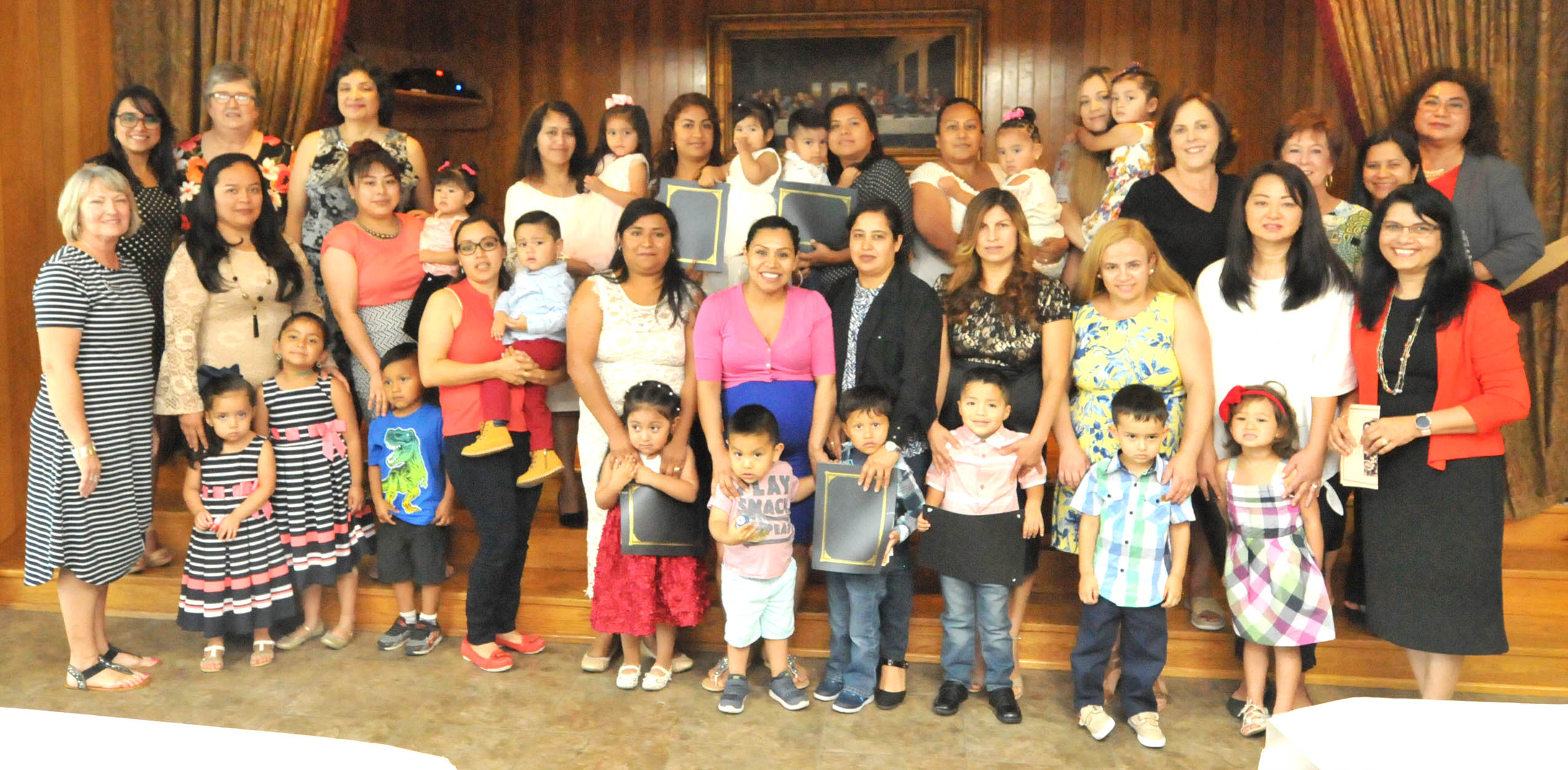 Click to enlarge,  Motheread, a grant-funded family literacy program, celebrated its fifth year of successful completion on June 6 at Angier Baptist Church in Angier. Pictured are mothers and children who participated in the program, as well as instructors, staff, and program supporters. 