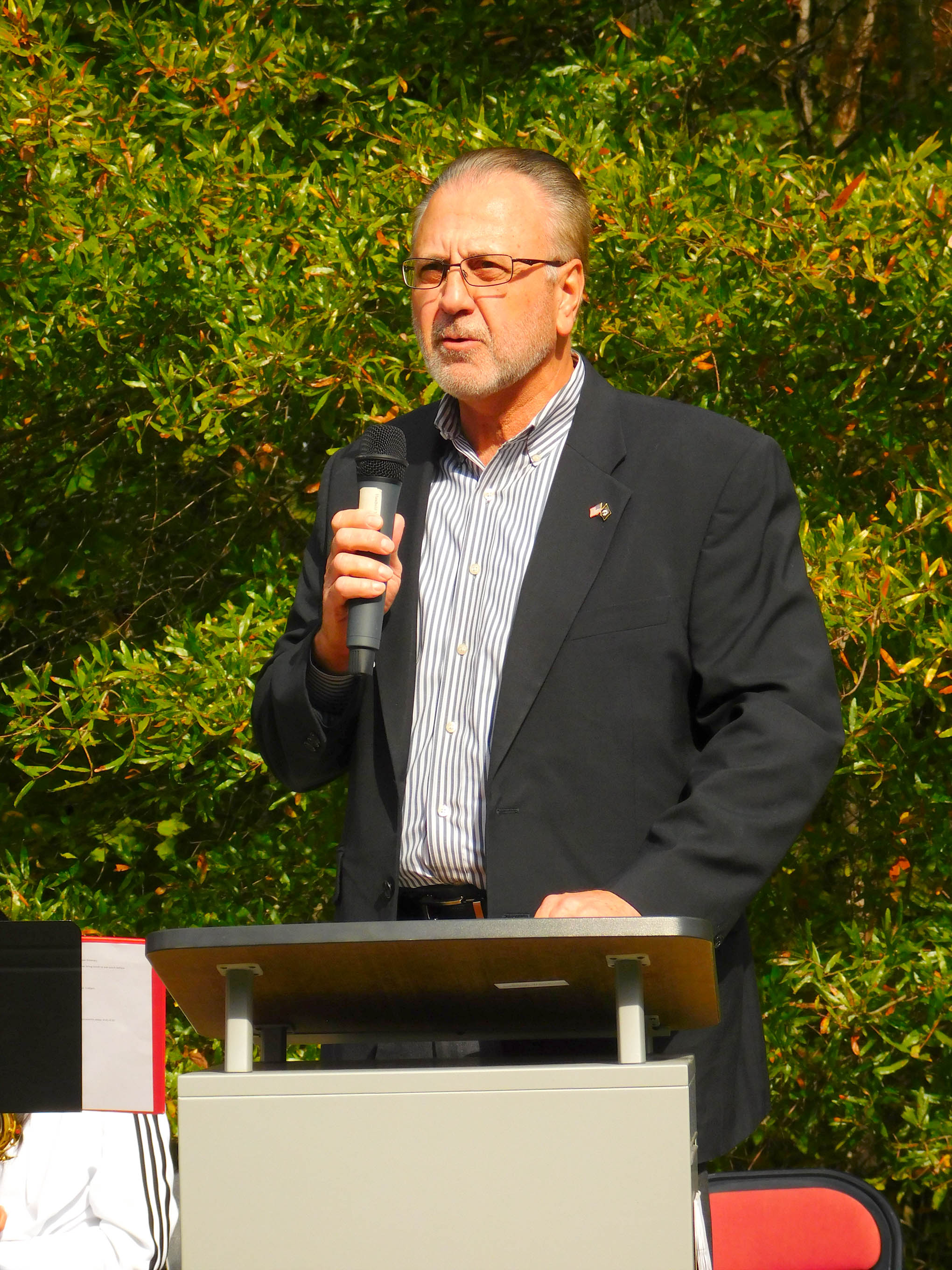 Click to enlarge,  Dennis Lewis, who served as an Army Colonel, was among the speakers at the 2019 Veterans Day observance at the Central Carolina Community College Siler City Center. 