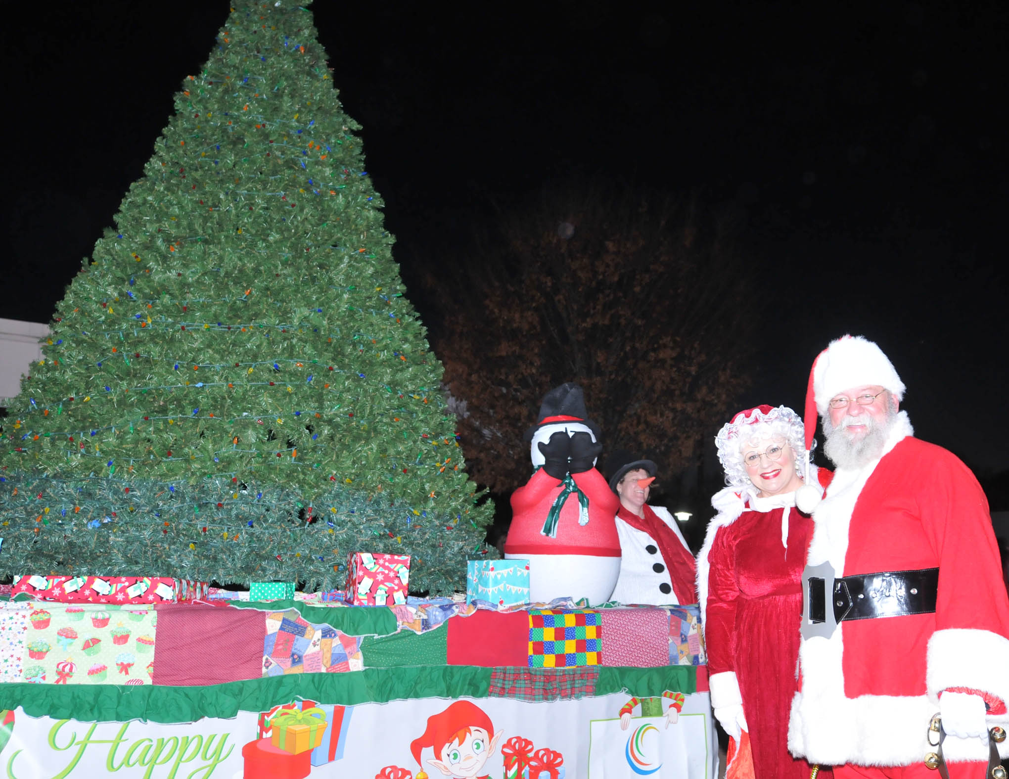 Click to enlarge,  Mr. and Mrs. Santa Claus were among those in attendance at the CCCC Foundation Christmas Tree Lighting celebration. 