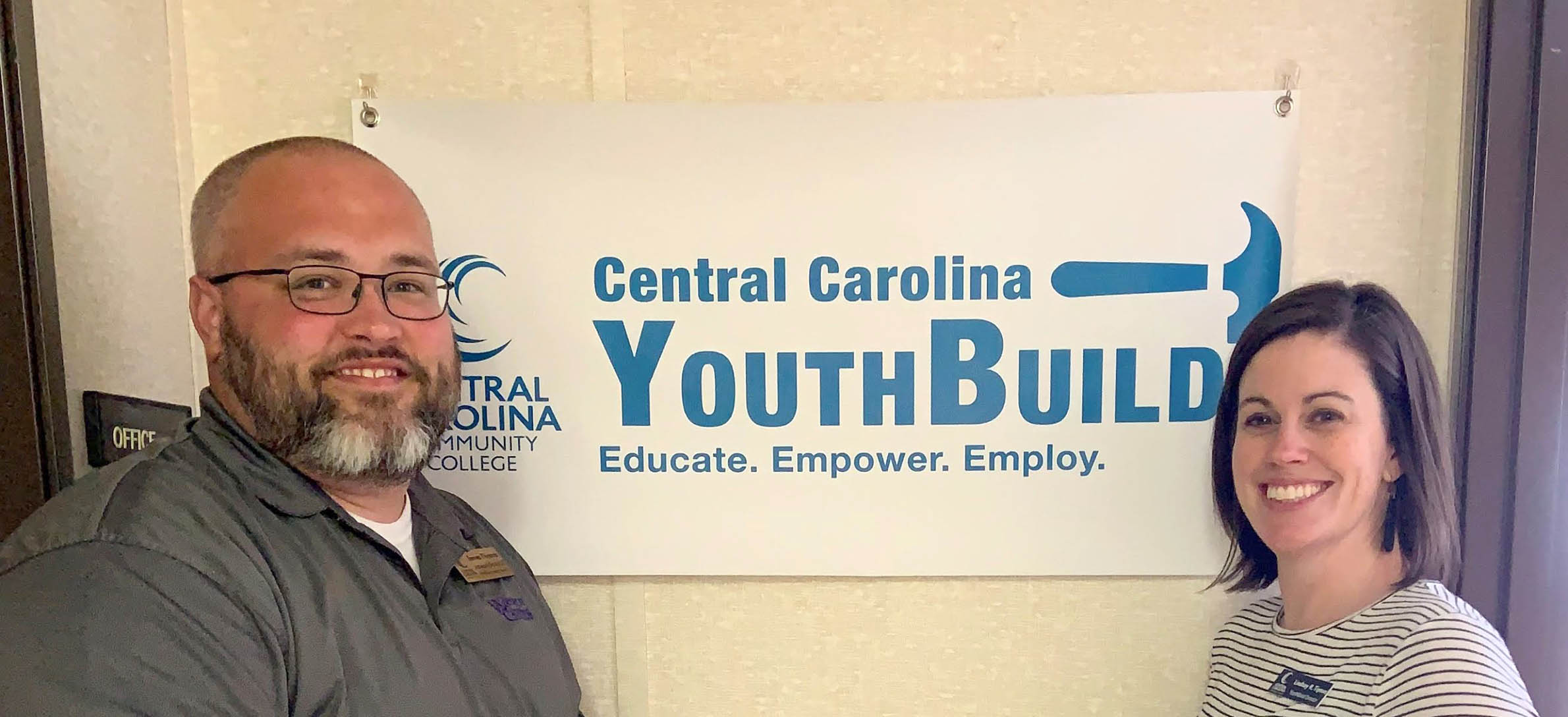 Click to enlarge,  James Thomas (left) and Lindsay Tipton (right) work with the Central Carolina Community College YouthBuild Program. 