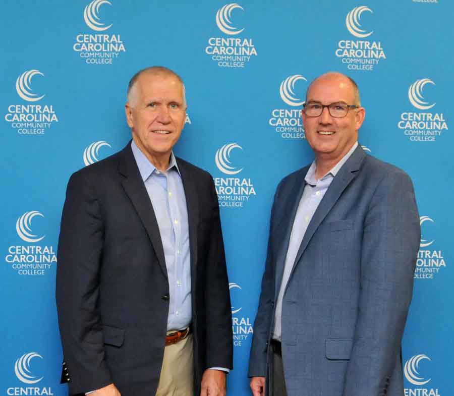 Click to enlarge,  U.S. Senator Thom Tillis (left) visits with Jimmy Randolph, CEO of the Sanford Area Growth Alliance. 