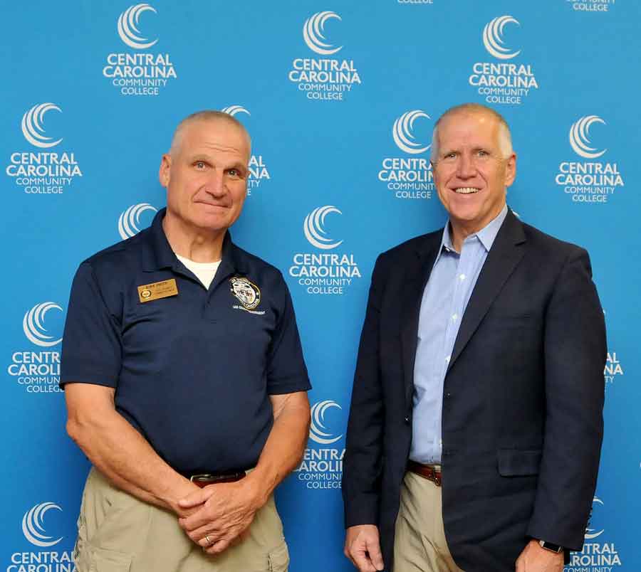 Click to enlarge,  U.S. Senator Thom Tillis (right) visits with Kirk Smith, Chairman of the Lee County Board of Commissioners. 