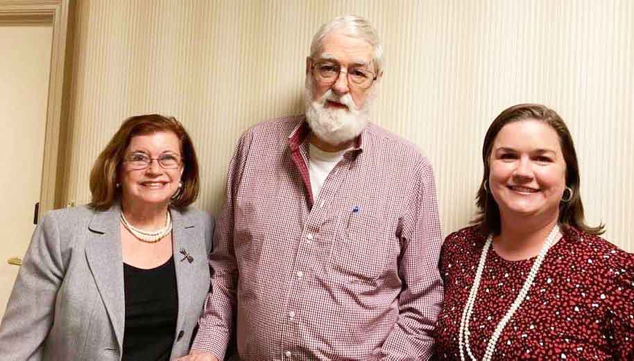 Click to enlarge,  Dr. John Williamson (center) visits with his cousin, Lynda F. Turbeville (left) of Sanford, who serves as the CCCC Foundation Chair, and Dr. Emily C. Hare (right), CCCC Foundation Executive Director. 