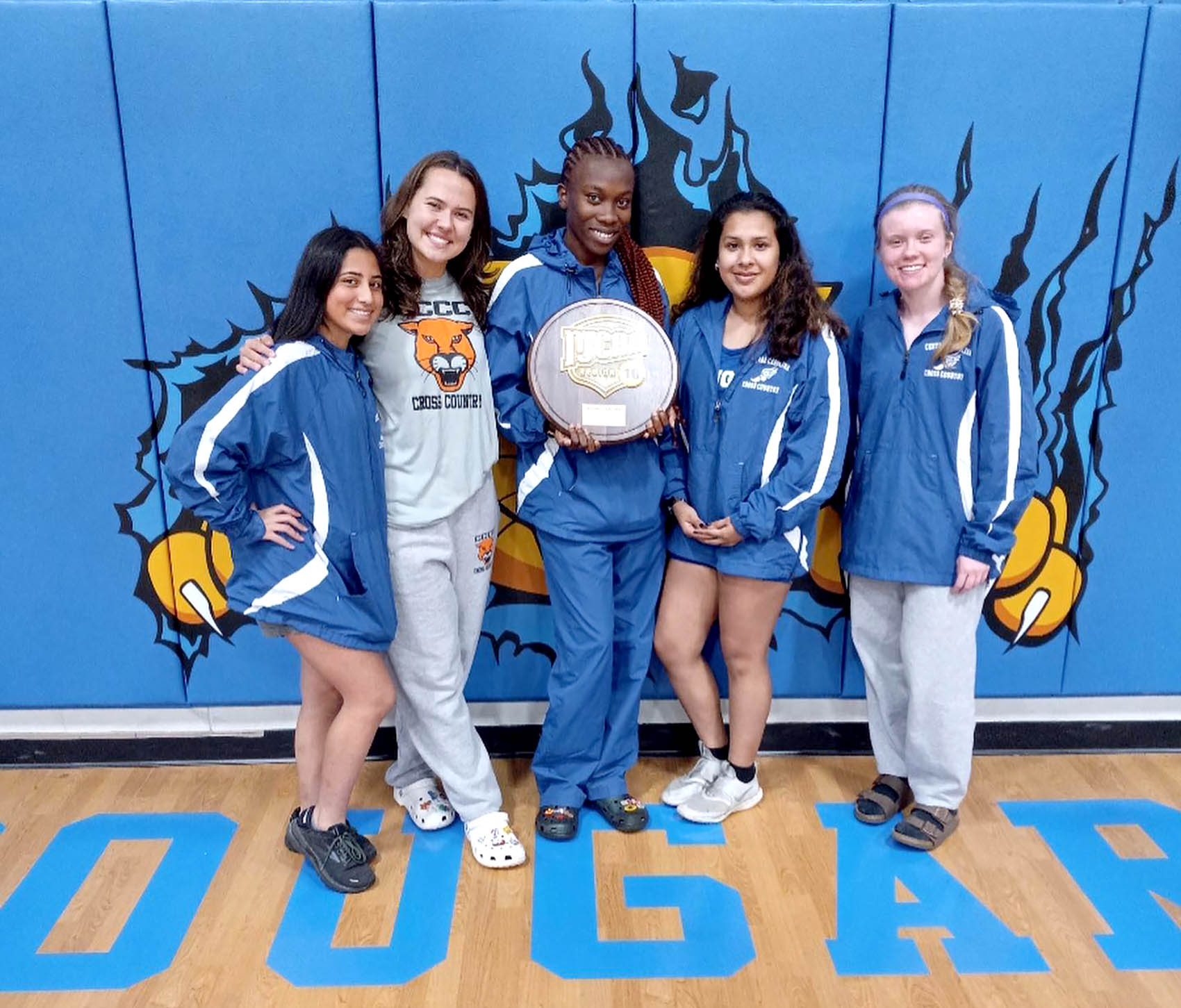 Click to enlarge,  Members of the Central Carolina Community College's National Junior College Athletic Association Region 10 Division III women's cross country champions are pictured, left to right: Kate Perez, Avery Blegen, Charmaine Robison, Emilie Obregon, and Lillian Bennett. 