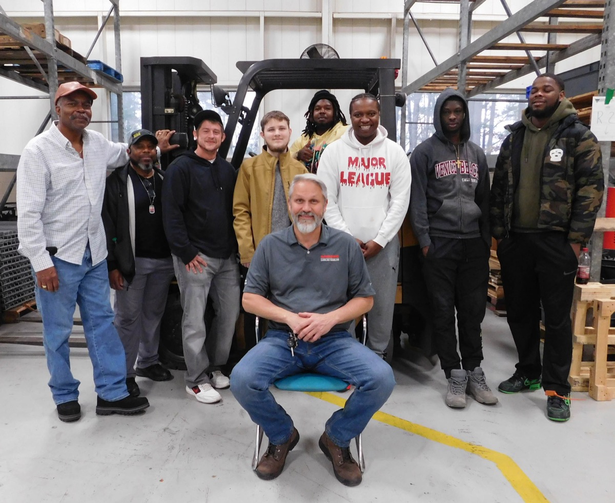 Click to enlarge,  The first CCCC Forklift Fundamentals and Job Readiness Boot Camp at Central Carolina Community College is pictured during a class session with Instructor Andy Duncan. 