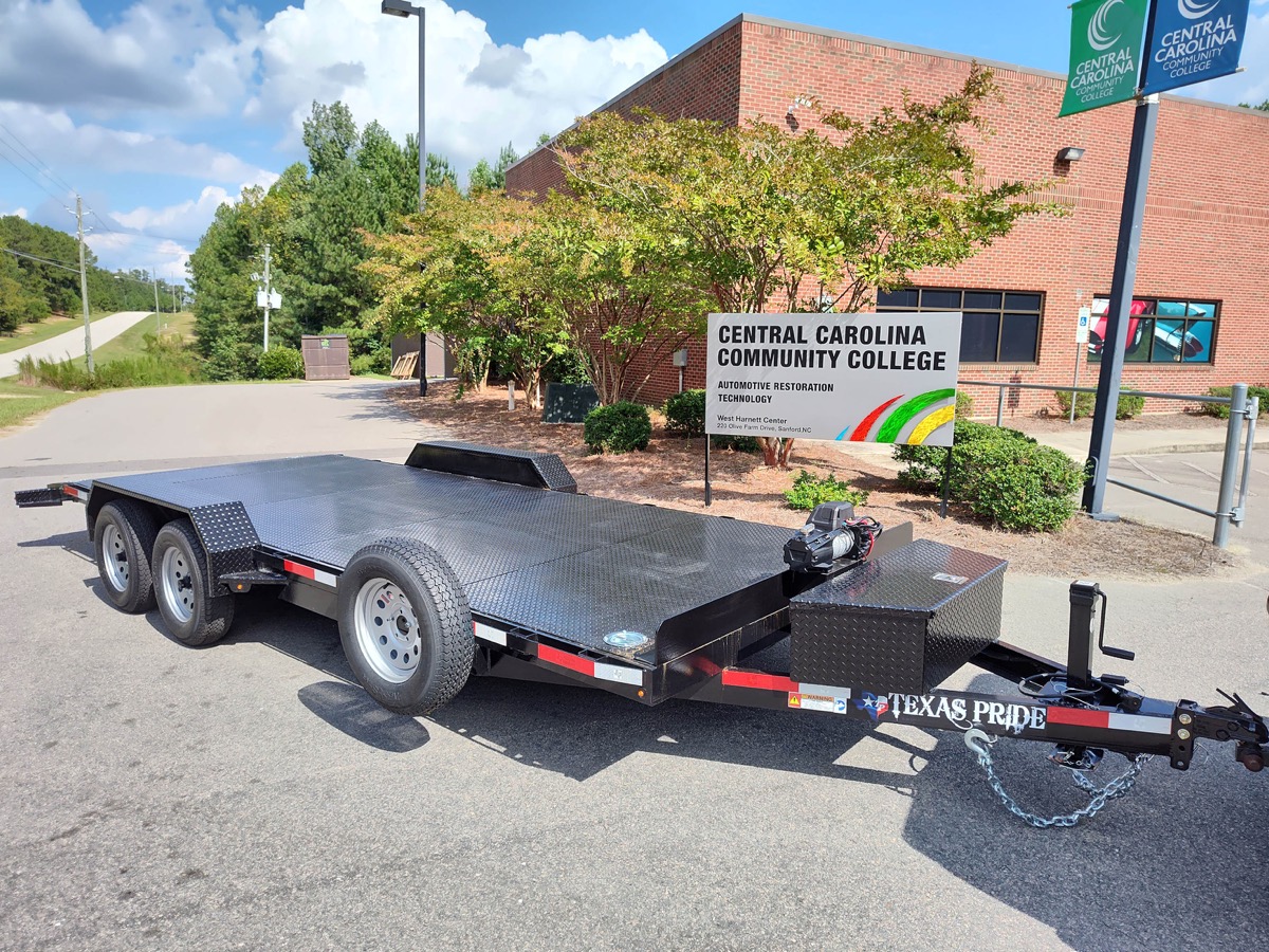 Click to enlarge,  Thanks to American television host, writer and comedian Jay Leno and Texas Pride Trailers, the Central Carolina Community College Automotive Restoration program has received a heavy duty trailer to be used to transport vehicles. 