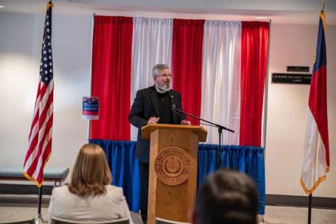 Salute    CCCC President Dr. Lisa M. Chapman, speakers Gary Gilliam and Dan Hardin, and other attendees salute the flag during the national anthem at the college’s Veterans Day ceremony at the Dennis A. Wicker Civic and Conference Center in Sanford on Nov. 12.    Hardin    Retired Col. Dan Hardin speaks at CCCC’s Veterans Day ceremony.        Orchestra    Members of the Lee County Community Orchestra play at CCCC’s Veterans Day ceremony. 