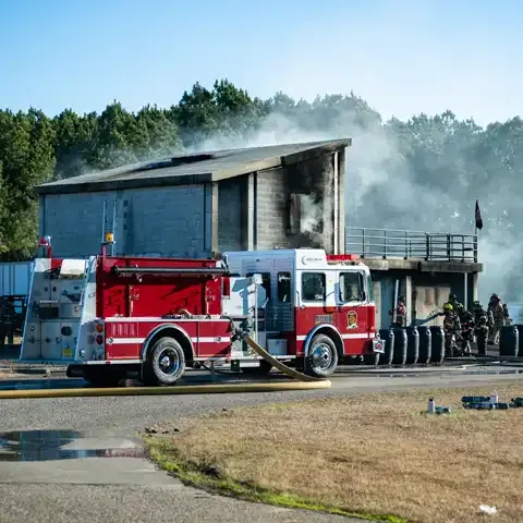 Fire Academy students responding to mock fire