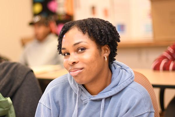 Proud student in class